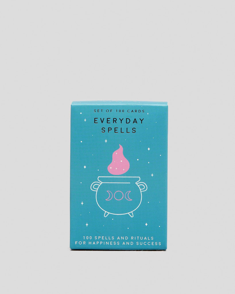 Card deck titled 'Everyday Spells' with a blue background and pink flame design.