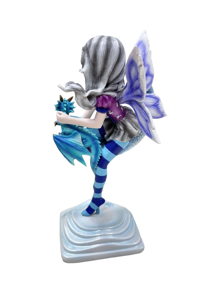 Fairy figurine with blue hair and a blue dragon on a white base