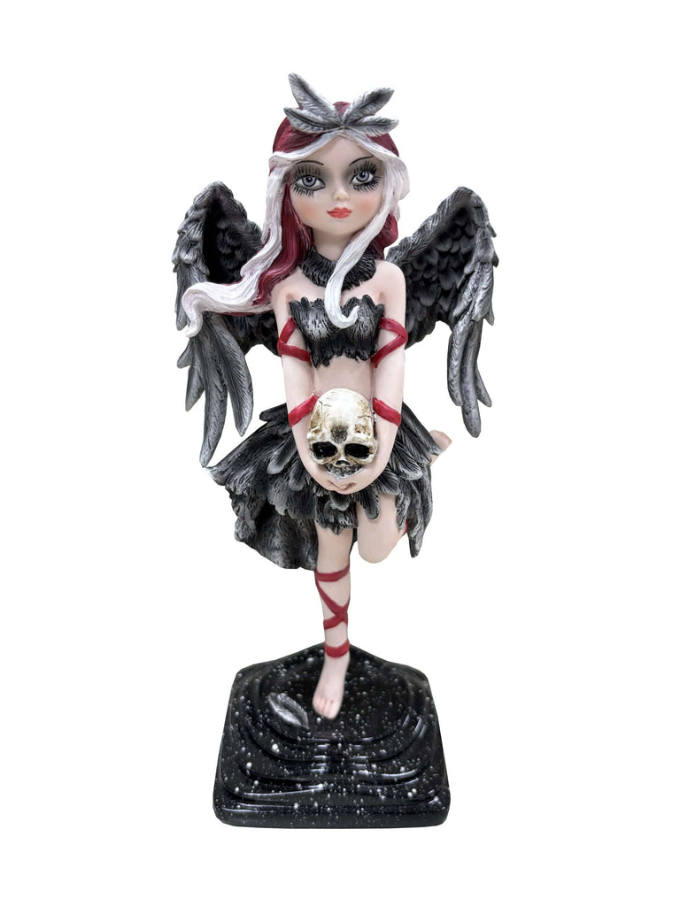 Gothic-style figurine with angel wings and skull on a white background
