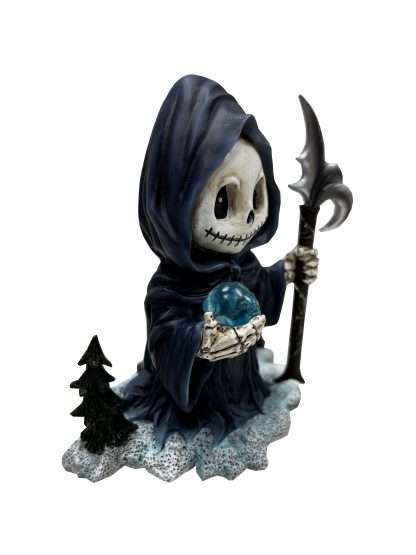 Statue of a grim reaper holding a crystal ball and a staff on a white background