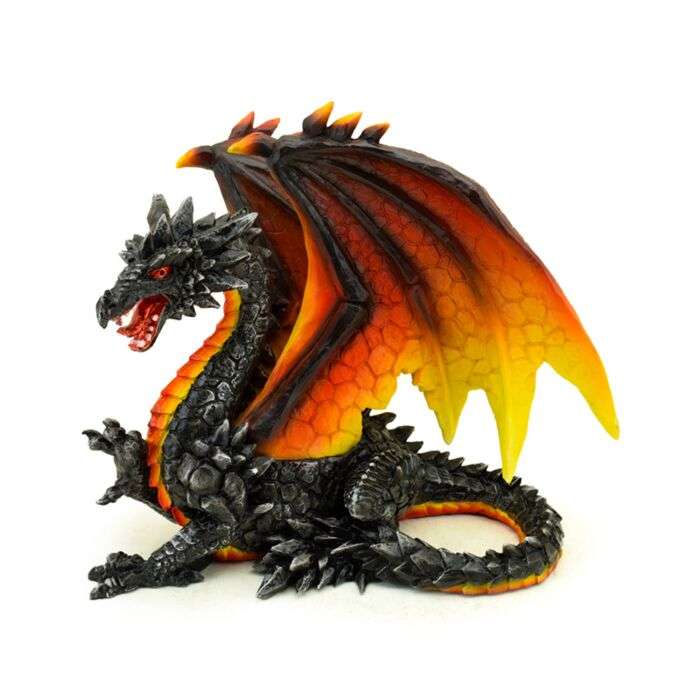 Dragon figurine with orange and yellow wings on a white background