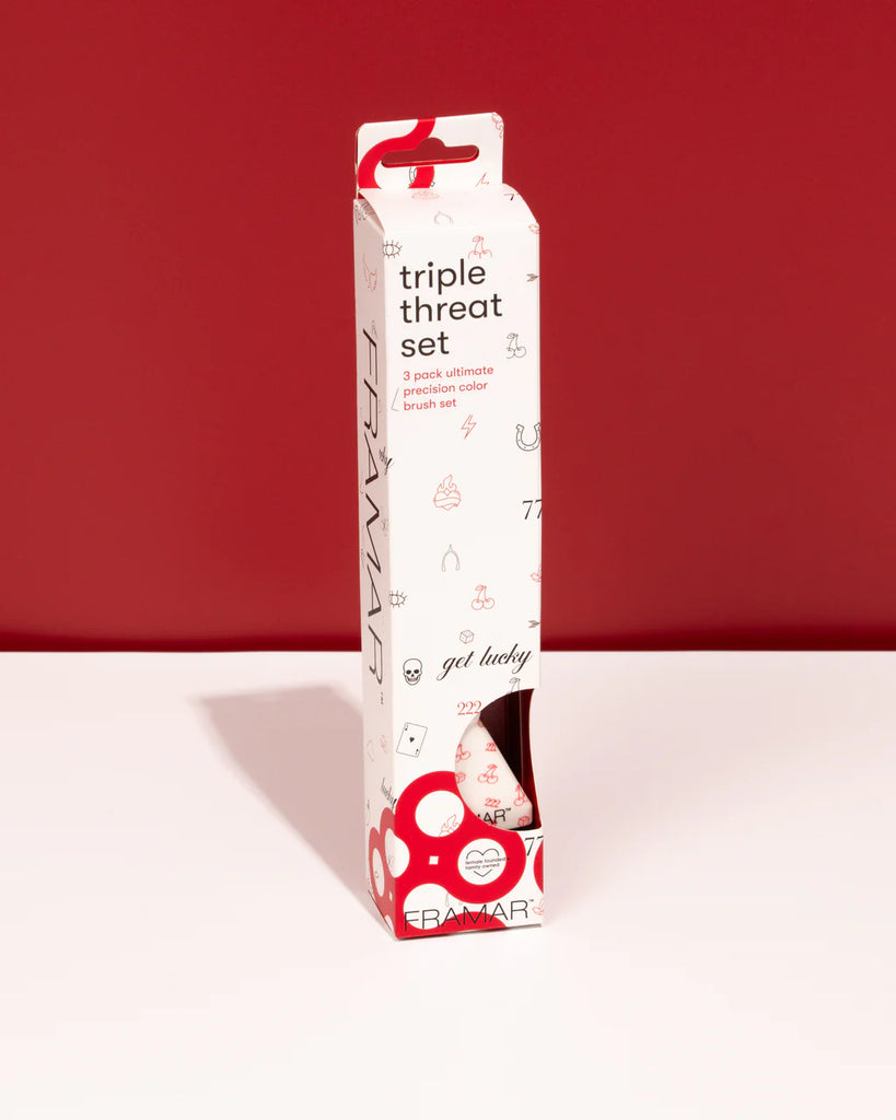 Packaging of a 'triple threat set' with a red background