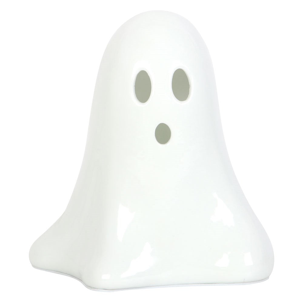 White ghost-shaped object with black eyes on a white background