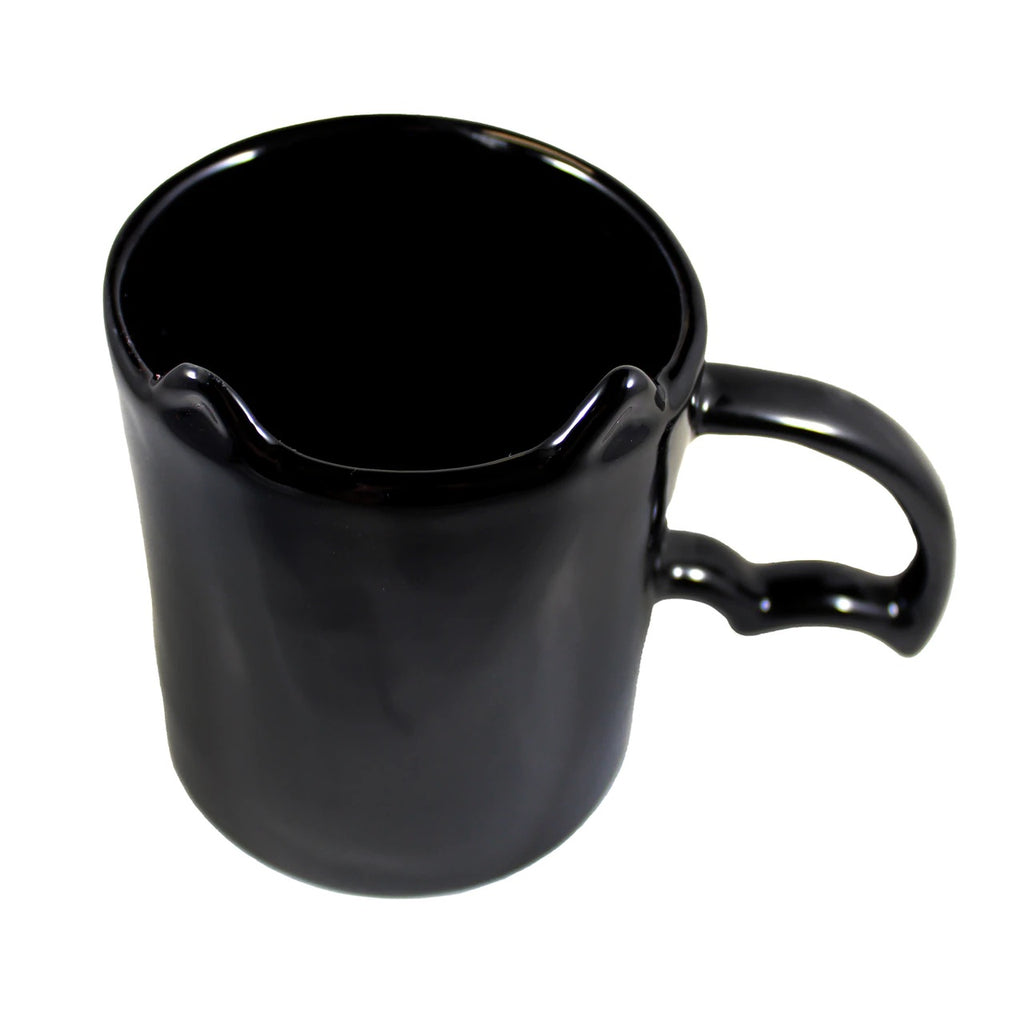 Black mug on a white background