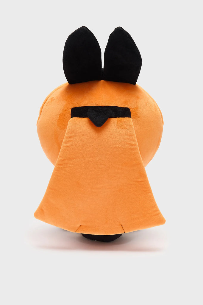 Back view of an orange plush toy with black ears on a white background