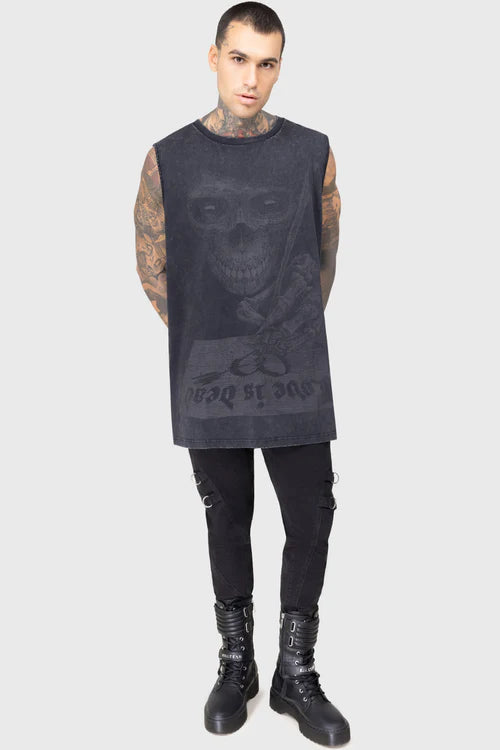 Person wearing a sleeveless black shirt with a skull design on a white background