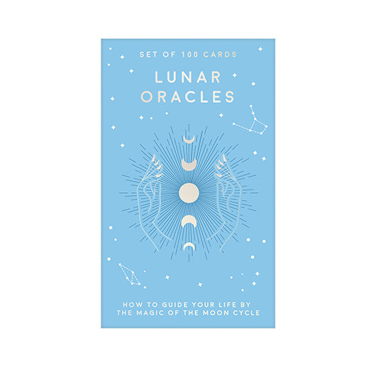 Card set packaging for 'Lunar Oracles' with celestial design on a light blue background
