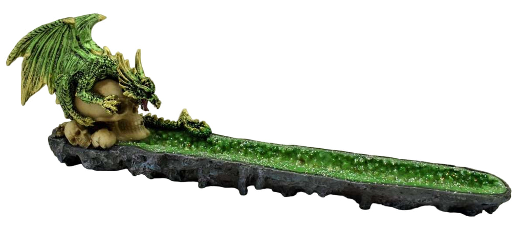 Green dragon figurine on a stone base against a plain background