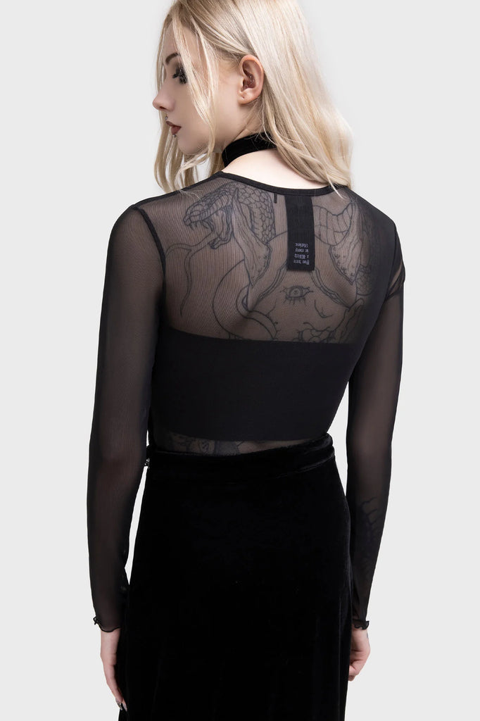 Black sheer long-sleeve top with intricate design on a plain background
