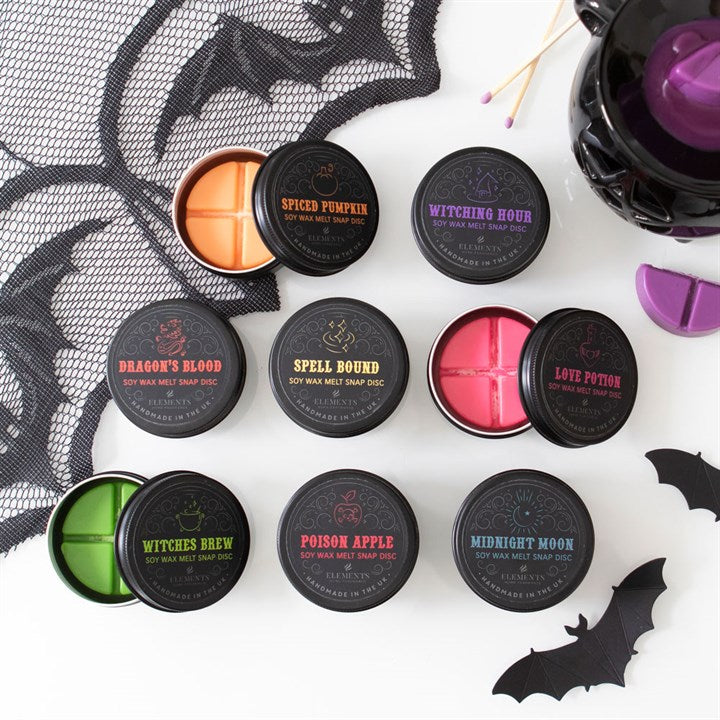 Assorted Halloween-themed wax melts in black containers with colorful labels on a white background.