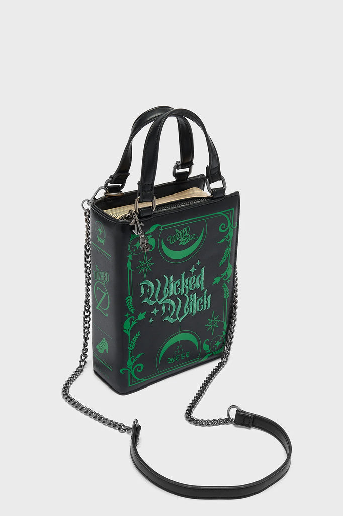 Book-shaped handbag with 'Wicked Witch' design on a white background