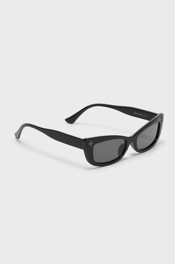 Black sunglasses on a light gray background