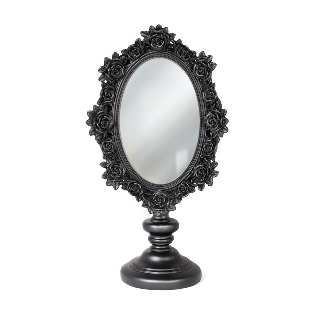 Decorative black mirror with floral frame on a white background